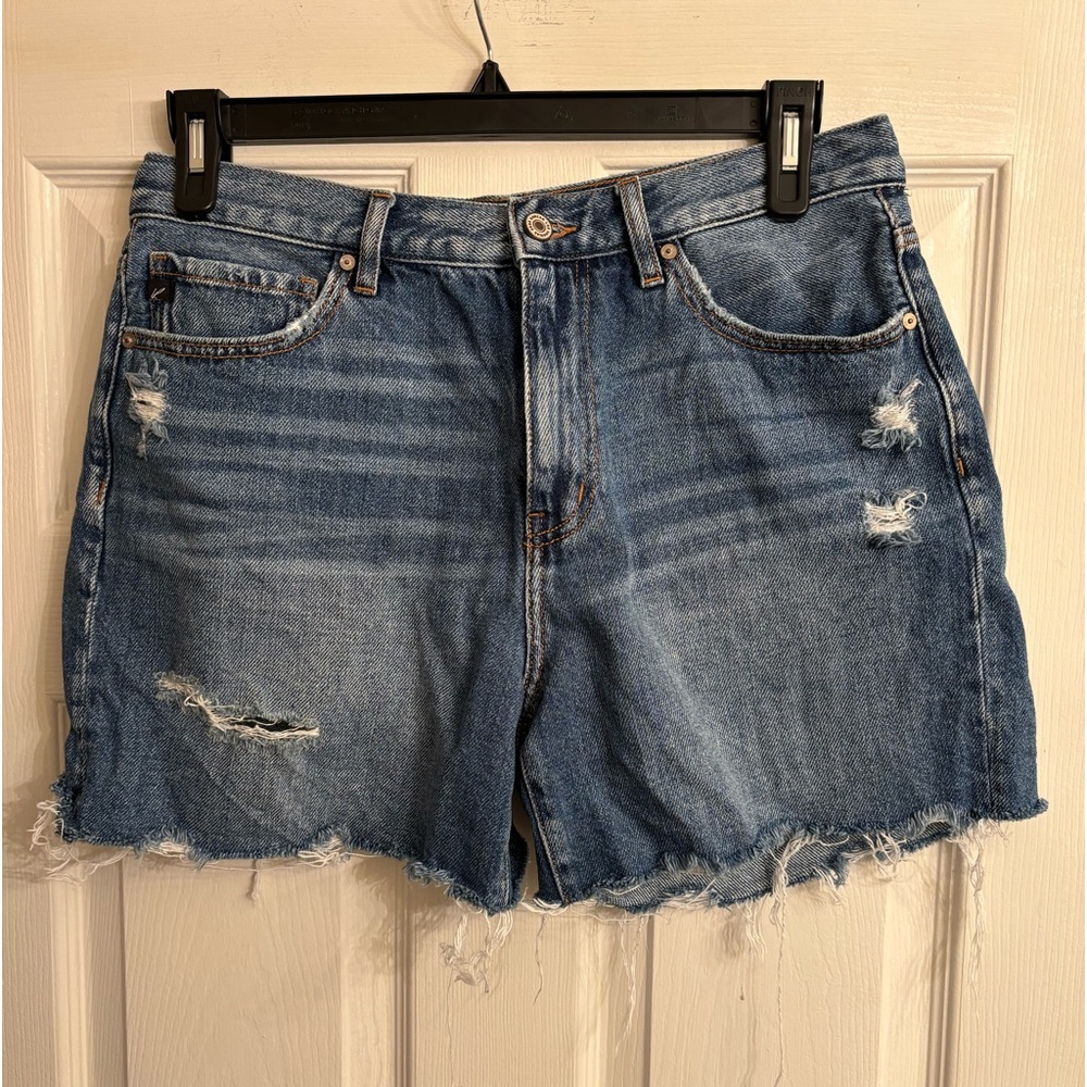 KanCan Women’s Distressed Jean Shorts. Color blue denim. Size 11 / 29